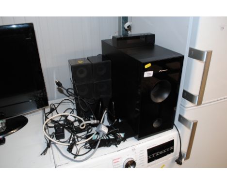A Pioneer base speaker and surround sound speakers