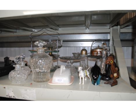 A quantity of various glass ware to include cake stand, a Poole Pottery dolphin, Beswick model of a Dalmatian AF etc.
