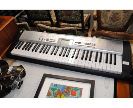 A Casio LK-130 electric keyboard