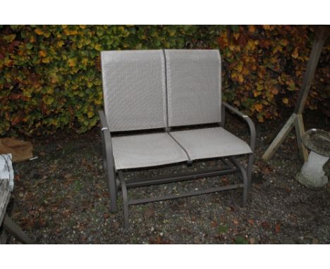 A rocking garden bench 