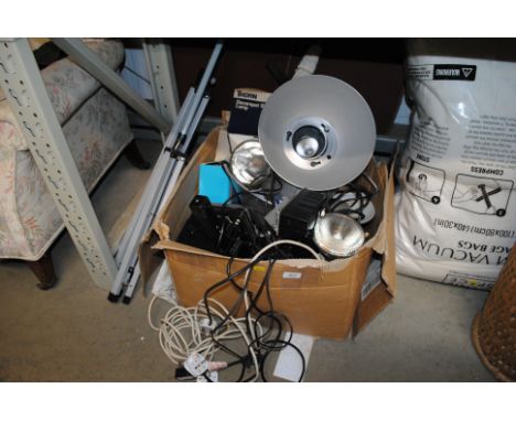 A quantity of various studio lighting to include Decor spot lamp, Portaflash etc.