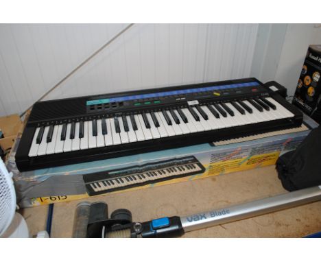 A Casio CT-615 electric keyboard