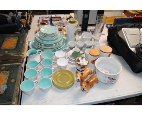 A collection of Poole twin tone tea and dinner ware, two model Corgi dogs, Suzy Cooper tea ware, J &amp; G Meakin coffee ware