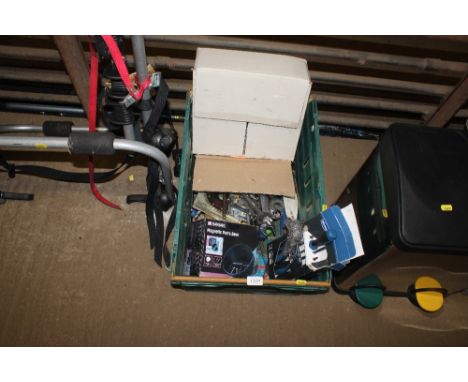A box containing various spanners, screwdrivers and other hand tools 