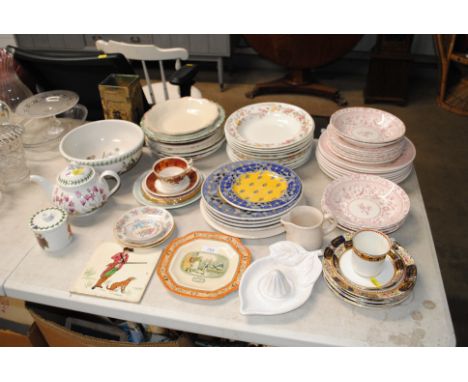 A Royal Doulton vase; a collection of Portmeirion china; a tile decorated with a hunting scene; various patterned tea and din