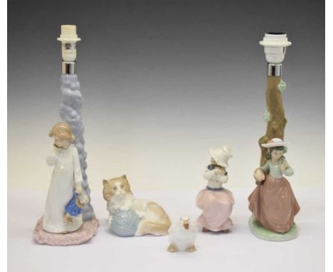 Two Nao porcelain lamps, 44cm high (ex. fitting), together with four porcelain figures to include; Eskimo Girl (1298), goose,