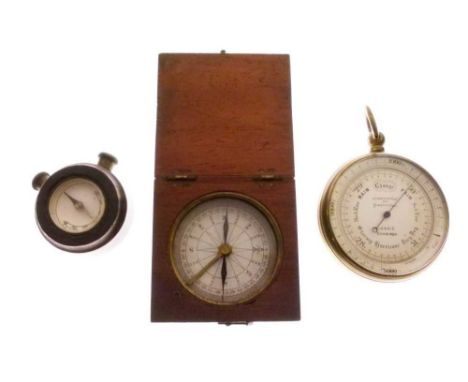 Pocket barometer by Lennie, Edinburgh, together with two compasses (3) 