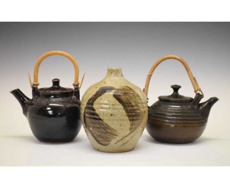 Winchcombe Pottery tenmoku glazed teapot by Ray Finch, another studio pottery teapot and an ovoid vase with brushwork decorat