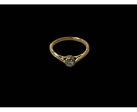 Diamond solitaire 18 carat gold ring, size L.