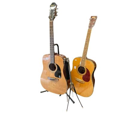 Epiphone and Stagg acoustic guitars, stand and music stand.