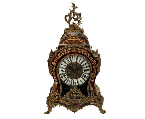 Gilt metal mounted Boullé mantel clock with enamel dial, 58cm.