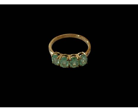 Emerald four stone 9 carat gold ring, size N/O.