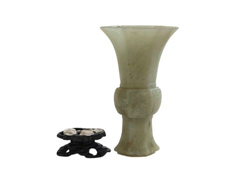 Qing Dynasty jade gu vase together with a small wood stand.