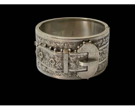 Victorian silver buckle bangle, hallmarked for Birmingham 1884, 3.75cm wide.