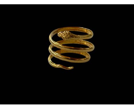 18 carat gold snake ring with ruby eyes, size S/T.