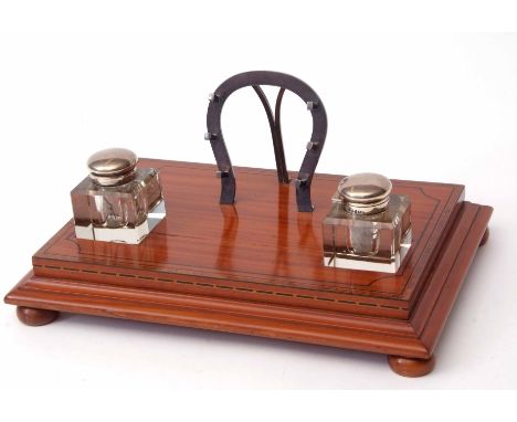 Late 19th century satinwood, ebony line inlaid and cross-banded inkstand of shaped rectangular form with moulded base and rai