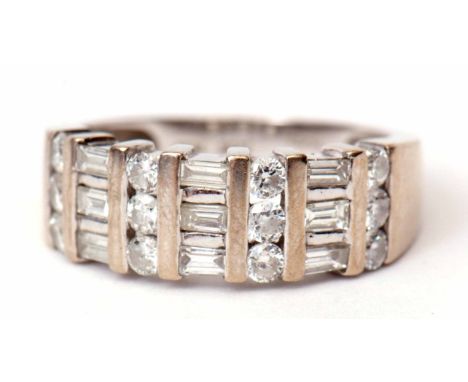 Precious metal and diamond cluster ring, alternate set with bands of small circular cut baguette diamonds, approx 0.7ct, stam