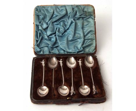 Cased set of six Victorian figural coffee spoons, each with plain and polished bowls, twisted stems and figural finials (one 