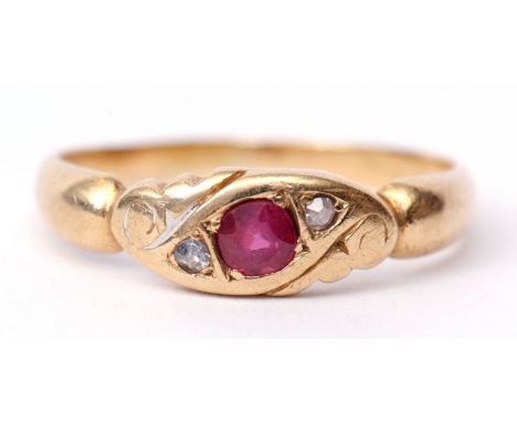 Yellow metal ruby and diamond ring, the central faceted ruby set between two small rose cut diamonds, size L  