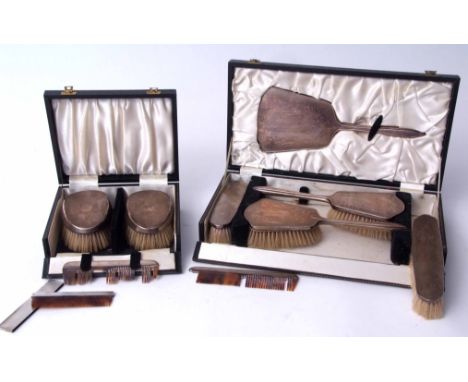 Mixed Lot: Elizabeth II cased six-piece dressing table set comprising hand mirror, two hair brushes, two clothes brushes and 