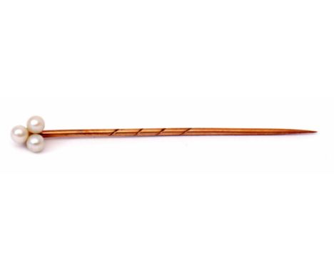 Antique yellow metal and seed pearl stick pin, the finial a cluster of 3 small seed pearls, 55mm long  