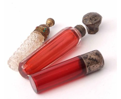Mixed Lot: three various scent bottles, the first of plain cylindrical ruby glass form with screw down cover, initialled and 