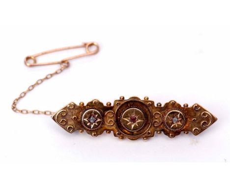 Antique 15ct gold Etruscan ruby and diamond brooch circa 1900, set with a small ruby and 2 rose cut diamonds, typically decor