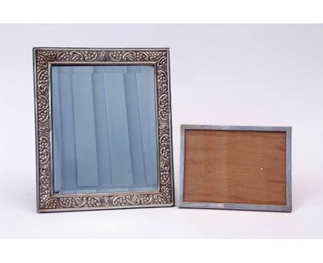 Mixed Lot: large silver mounted easel backed dressing table mirror of rectangular form with embossed and applied border with 