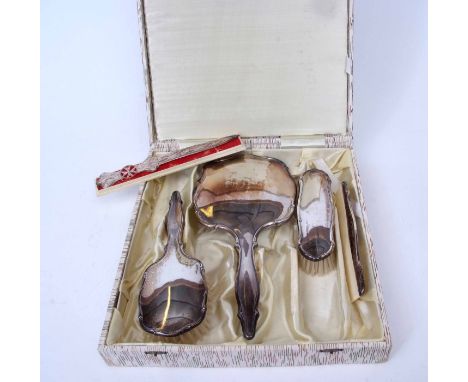 Second half of 20th century Continental white metal mounted and cased four-piece dressing table set comprising hand mirror, h