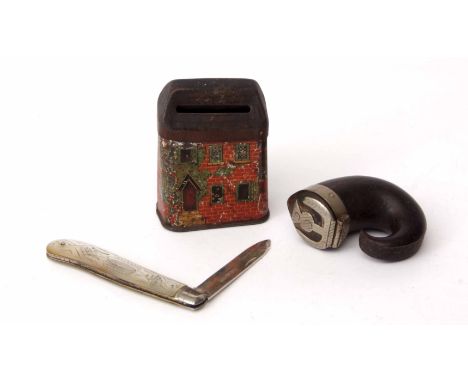 Mixed Lot: small transfer decorated tin money box modelled in the form of a cottage by Rothwell, Golborne, a silver bladed fo