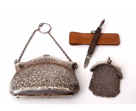 Mixed Lot: George V silver bodied evening purse of hinged and shaped form with all over engraved foliate decoration and initi