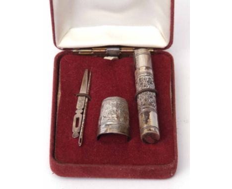 Cased silver sewing compendium comprising needle case, thimble, and darning needle contained in a fitted plush lined case 