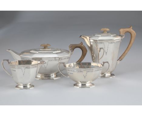 Art Deco Style design silver four piece tea service. Assay marked Sheffield 1951 by Goldsmiths and Silversmiths Company, 50oz