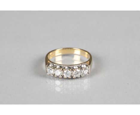 Ladies five stone diamond ring each stone 0.15 carat on an 18 carat gold shank