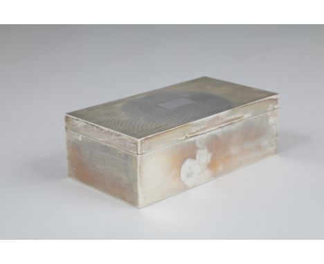 Silver cigarette box, engine turned hinged cover.  Assay marked Birmingham 1948 Alex Clark &amp; Co. London, 17cm long, 9cm w