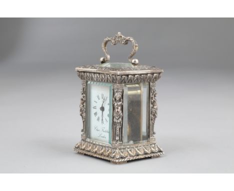 Silver cased carriage clock by Charles Frodsham, London white dial with Roman numerals, bevelled glass, scroll swing handle w