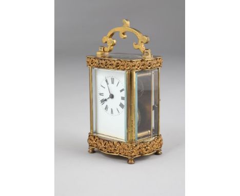 French brass carriage clock white enamelled dial with Roman numerals.  11.5cm high (excluding handle)