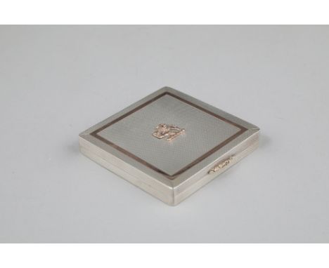 Ladies silver compact, square form, engine turned decoration hinged cover with a mirrored interior.  Assay marked Birmingham 