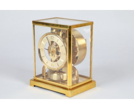 Jaeger Le Coultre Atmos clock, champagne coloured chapter ring with gilt numbers and batons, No 89774, 18cm long 13.5cm wide 