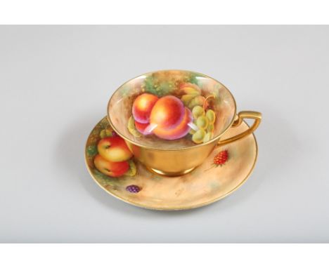 Royal Worcester teacup and saucer hand painted with fallen fruit in a naturalistic background, signed A Shuck.  
