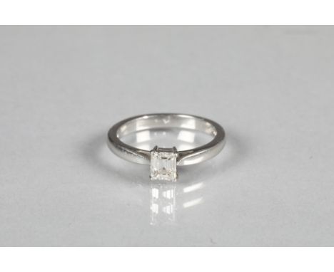 Ladies platinum solitaire diamond ring, set with a 0.42 carat emerald cut diamond. Ring size M Ring is in very good condition