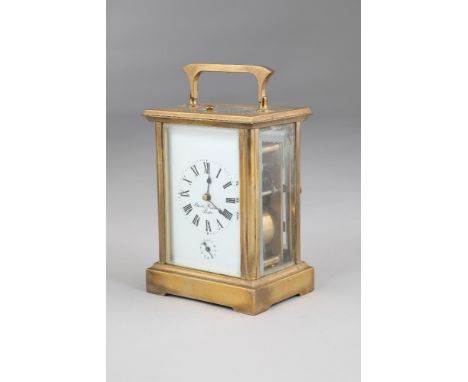 French repeating brass carriage clock by Charles Frodsham, London, mid 20th Century, white dial with Roman numerals and alarm