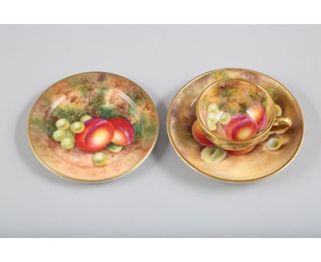 Royal Worcester miniature trio cup, saucer and side plate. All hand painted with fruit a naturalistic background. Signed Free