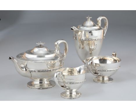 Silver four piece silver tea service, Celtic border. Assay marked Glasgow 1925, Fenton Russell & Co Ltd, 68oz Coffee and tea 