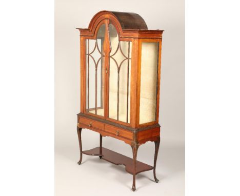 Edwardian inlaid mahogany display cabinet arched top over twin glazed doors over two fitted drawers on four legs with under s