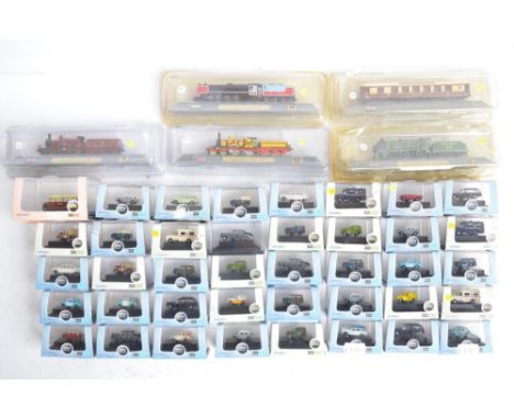 Forty boxed 1/148 scale (N gauge) diecast model vehicles from Oxford Diecast, mostly vintage types including Ambulances, 3x D