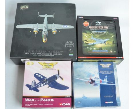 Four 1/72 scale diecast WWII US aircraft models to include Forces Of Valor B-25J Mitchell (fair/good overall condition, some 