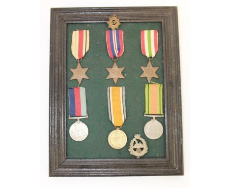 Framed collection of Medals. Africa Star, 1939-45 Star, Italy Star, 1939-45 Defence Medal, War Medal, WWI Victory Medal. To 3