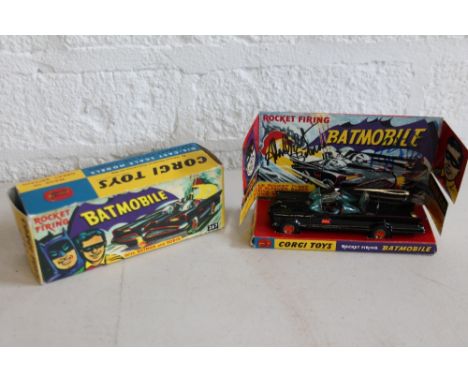 BATMAN - DC COMICS - an original 267 Corgi Toys rocket firing Batmobile with Batman and Robin in reproduction box signed on i