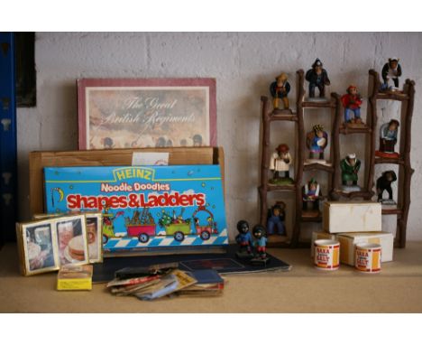 VINTAGE ADVERTISING - a range of collectable items to include a ceramic family of 12 clothed chimpanzees and a display stand 